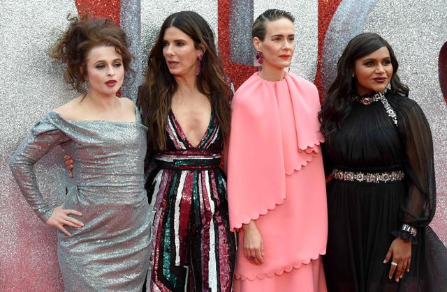 English actress Helena Bonham Carter (L), US actor Sandra Bullock (2L), US actor Sarah Paulson (2R) and US actor Mindy Kaling pose on the carpet upon arrival to attend he European premiere of the film Ocean's 8. (AFP) English actress Helena Bonham Carter (L), US actor Sandra Bullock (2L), US actor Sarah Paulson (2R) and US actor Mindy Kaling pose on the carpet upon arrival to attend he European premiere of the film Ocean's 8. (AFP)