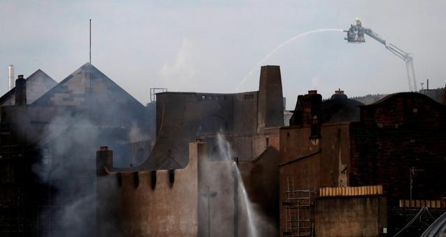 Firefighters attend to a blaze at the Mackintosh Building at the Glasgow School of Art. (Reuters photo) Firefighters attend to a blaze at the Mackintosh Building at the Glasgow School of Art. (Reuters photo)