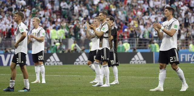 German players walk to their supporters after losing the group F match against Mexico. (AP) German players walk to their supporters after losing the group F match against Mexico. (AP)