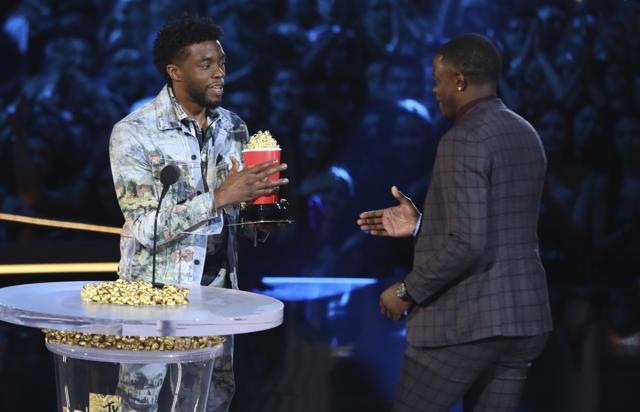 Chadwick Boseman, left, gives his best hero award for his role in Black Panther to James Shaw Jr., who is credited with saving lives during a shooting at a Waffle House in Antioch. (Matt Sayles/Invision/AP) Chadwick Boseman, left, gives his best hero award for his role in Black Panther to James Shaw Jr., who is credited with saving lives during a shooting at a Waffle House in Antioch. (Matt Sayles/Invision/AP)