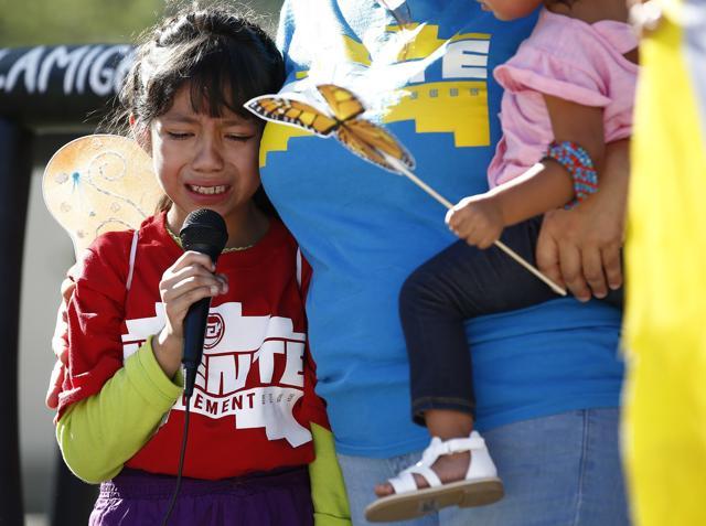 Akemi Vargas, 8, cries as she talks about being separated from her father during an immigration family separation protest in front of the Sandra Day O'Connor US District Court building, in Phoenix. (AP Photo) Akemi Vargas, 8, cries as she talks about being separated from her father during an immigration family separation protest in front of the Sandra Day O'Connor US District Court building, in Phoenix. (AP Photo)