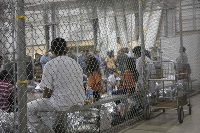 This US Customs and Border Protection photo obtained June 18, 2018 shows intake of illegal border crossers by US Border Patrol agents at the Central Processing Center in McAllen, Texas on May 23, 2018. (AFP Photo) This US Customs and Border Protection photo obtained June 18, 2018 shows intake of illegal border crossers by US Border Patrol agents at the Central Processing Center in McAllen, Texas on May 23, 2018. (AFP Photo)