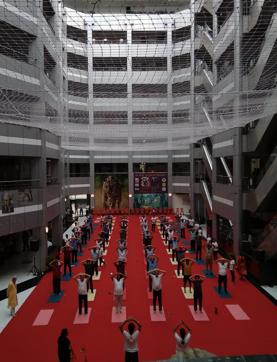 State government employees doing yoga at Mantralaya on Thursday morning. (Anshuman Poyrekar/HT Photo)