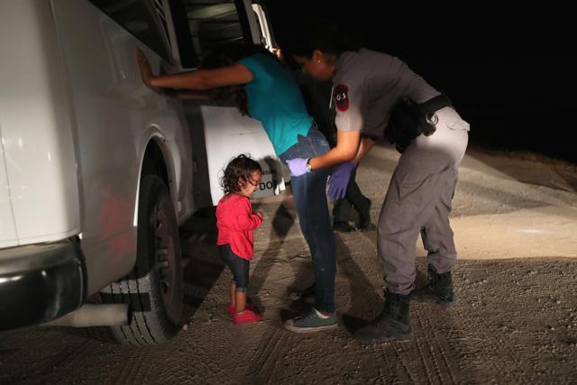 A two-year-old Honduran asylum seeker cries as her mother is searched and detained near the U.S.-Mexico border on June 12, 2018 in McAllen, Texas. (AFP) A two-year-old Honduran asylum seeker cries as her mother is searched and detained near the U.S.-Mexico border on June 12, 2018 in McAllen, Texas. (AFP)