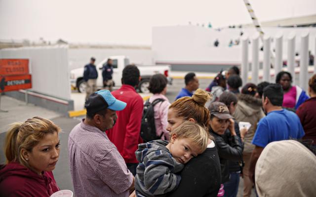 Migrants waiting for asylum hearings to gain entry into the United States, in Tijuana, Mexico, June 20, 2018. Photos, video and audio of children being separated from their families at the United States' border with Mexico have sparked international outrage. (NYT) Migrants waiting for asylum hearings to gain entry into the United States, in Tijuana, Mexico, June 20, 2018. Photos, video and audio of children being separated from their families at the United States' border with Mexico have sparked international outrage. (NYT)
