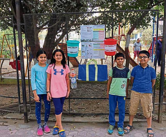 (Left to right) Reva Nagar, Rutuja Ubale, Shubankar Thenge and Vikrant Patil, actively promote garbage segregation. (HT PHOTO)