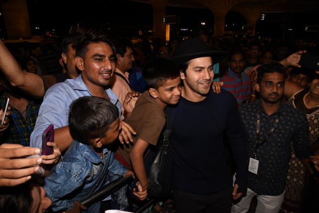 Varun Dhawan seen posing with young fans at the airport. (Viral Bhayani)