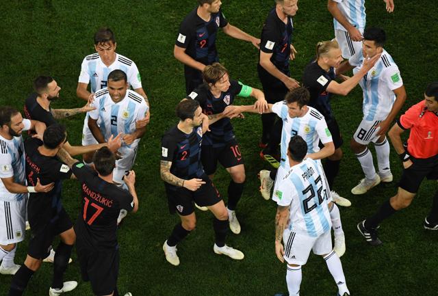 Croatia's players argue with Argentina's players after a foul on Croatia's midfielder Ivan Rakitic during the Russia 2018 World Cup Group D football match in Nizhny Novgorod on June 21, 2018. (AFP) Croatia's players argue with Argentina's players after a foul on Croatia's midfielder Ivan Rakitic during the Russia 2018 World Cup Group D football match in Nizhny Novgorod on June 21, 2018. (AFP)