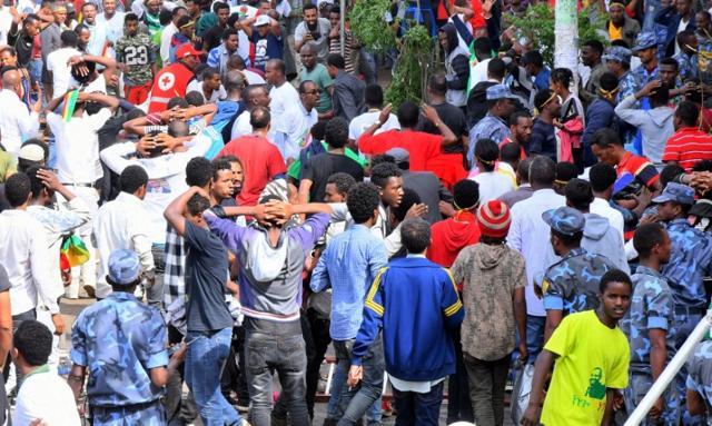 Ethiopians react after an explosion during a rally in support of the new Prime Minister Abiy Ahmed in Addis Ababa, Ethiopia June 23, 2018. (REUTERS/Stringer) Ethiopians react after an explosion during a rally in support of the new Prime Minister Abiy Ahmed in Addis Ababa, Ethiopia June 23, 2018. (REUTERS/Stringer)