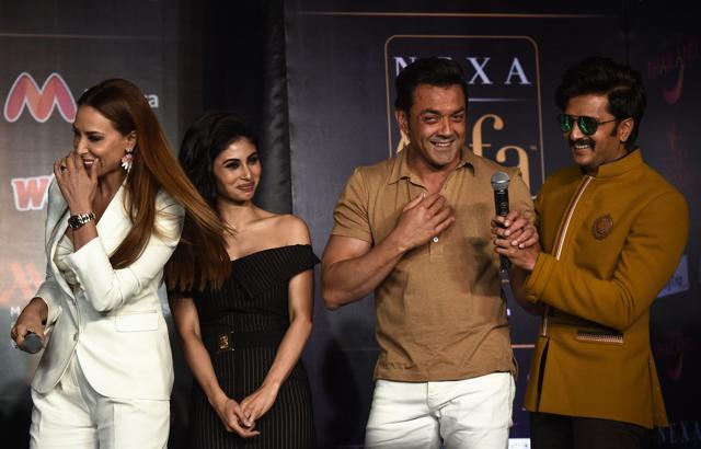 Bollywood singer Iulia Vantur , Mouni Roy, Bobby Deol and Ritesh Deshmukh share a light moment onstage during a press conference at the 19th International Indian Film Academy (IIFA) festival in Bangkok on June 22, 2018. (AFP) Bollywood singer Iulia Vantur , Mouni Roy, Bobby Deol and Ritesh Deshmukh share a light moment onstage during a press conference at the 19th International Indian Film Academy (IIFA) festival in Bangkok on June 22, 2018. (AFP)