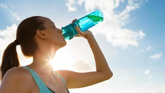 Drinking enough water can help you detoxify, boost digestion, improve the quality of your skin and hair and help you feel well-balanced. (Shutterstock)