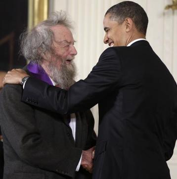 President Barack Obama presents a 2010 National Medal of Arts to poet Donald Hall, during in a ceremony in the East Room of the White House in Washington. (AP)
