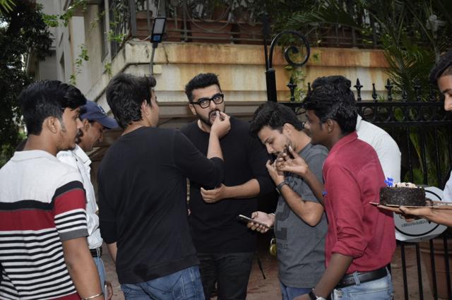 Actor Arjun Kapoor celebrates his birthday with his fans outside his residence in Juhu, Mumbai. (IANS) Actor Arjun Kapoor celebrates his birthday with his fans outside his residence in Juhu, Mumbai. (IANS)