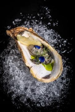 Rock Oysters served with an apple chutney, a spicy Asian sauce and Caviar, at Zoravar Kalra’s new restaurant, Rivers to Oceans. Rock Oysters served with an apple chutney, a spicy Asian sauce and Caviar, at Zoravar Kalra’s new restaurant, Rivers to Oceans.