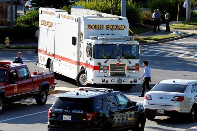 Emergency response vehicles drive near a shooting scene after a gunman opened fire at the Capital Gazette newspaper in Annapolis. (Reuters Photo) Emergency response vehicles drive near a shooting scene after a gunman opened fire at the Capital Gazette newspaper in Annapolis. (Reuters Photo)
