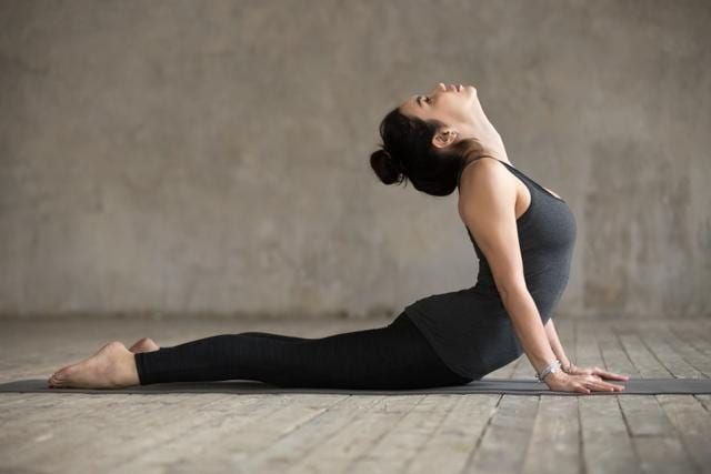 International Yoga Day: 5 yoga poses for acidity | HealthShots