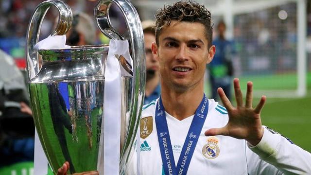 Former Real Madrid striker Cristiano Ronaldo poses with the after Los Blancos won the Champions League. Former Real Madrid striker Cristiano Ronaldo poses with the after Los Blancos won the Champions League.
