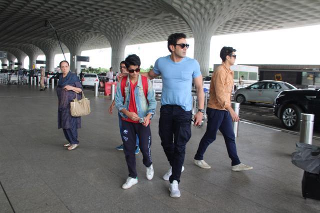 Bobby Deol with his two sons. Bobby Deol with his two sons.