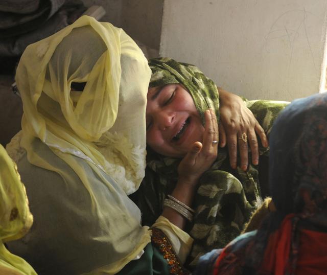 Women mourn during the funeral for Javaid Ahmed Dar in his village Vehil Chatwatan, Kashmir, on Friday. (Waseem Andrabi / HT Photo) Women mourn during the funeral for Javaid Ahmed Dar in his village Vehil Chatwatan, Kashmir, on Friday. (Waseem Andrabi / HT Photo)