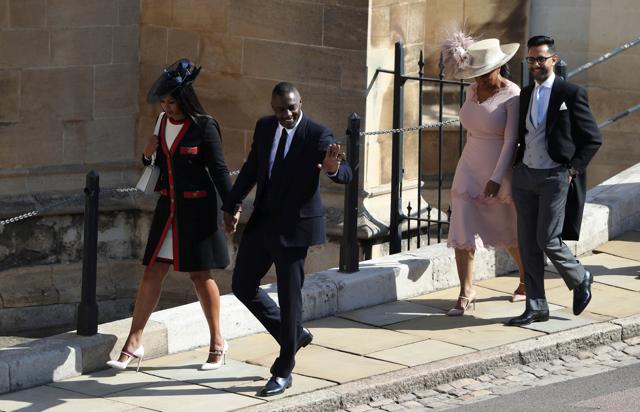 Idris Elba (second from left) and Oprah Winfery (second from right) arrive at St George's Chapel at Windsor Castle for the wedding of Megan Markle and Prince Harry in Windsor, Britain. (REUTERS) Idris Elba (second from left) and Oprah Winfery (second from right) arrive at St George's Chapel at Windsor Castle for the wedding of Megan Markle and Prince Harry in Windsor, Britain. (REUTERS)