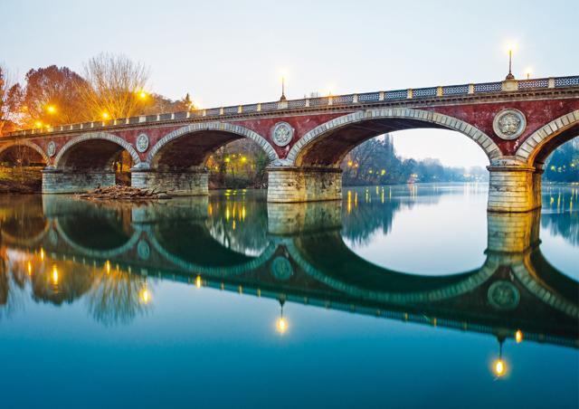 Among the ornate bridges across the river Po, this one remains distinct Among the ornate bridges across the river Po, this one remains distinct