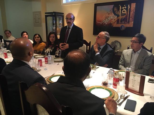 Masood Khan (standing) speaks as Liberal MP Rob Oliphant looks up at him during a meeting in Toronto. (Twitter) Masood Khan (standing) speaks as Liberal MP Rob Oliphant looks up at him during a meeting in Toronto. (Twitter)