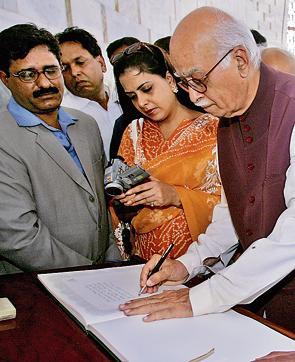 A PAGE OF HISTORY: Advani’s 2005 Pakistan visit is believed to have led to the loss of his BJP presidency. In the visitors’ book at the Jinnah mausoleum in Karachi, he wrote: ‘There are very few who actually create history. Quaid-e-Azam Muhammad Ali Jinnah was one such rare individual.’ (Reuters photo) A PAGE OF HISTORY: Advani’s 2005 Pakistan visit is believed to have led to the loss of his BJP presidency. In the visitors’ book at the Jinnah mausoleum in Karachi, he wrote: ‘There are very few who actually create history. Quaid-e-Azam Muhammad Ali Jinnah was one such rare individual.’ (Reuters photo)