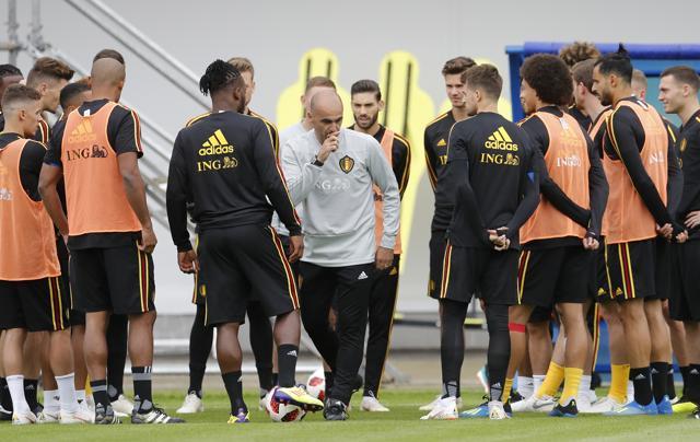 Belgium coach Roberto Martinez, center, speaks to his players during a training session. (AP) Belgium coach Roberto Martinez, center, speaks to his players during a training session. (AP)