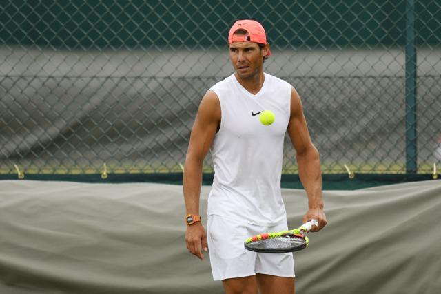 Rafael Nadal practices on the training courts on the eighth day of the 2018 Wimbledon Championships. (AFP) Rafael Nadal practices on the training courts on the eighth day of the 2018 Wimbledon Championships. (AFP)