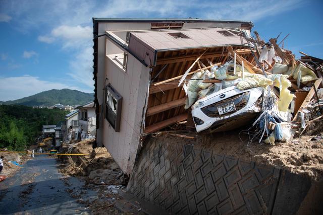 This photo shows a damaged house in a flood hit area in Kumano, Hiroshima prefecture on July 9, 2018. (AFP) This photo shows a damaged house in a flood hit area in Kumano, Hiroshima prefecture on July 9, 2018. (AFP)