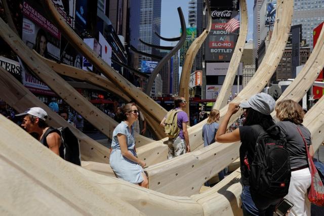 Pedestrians look at artist Mel Chin's Unmoored. (REUTERS)