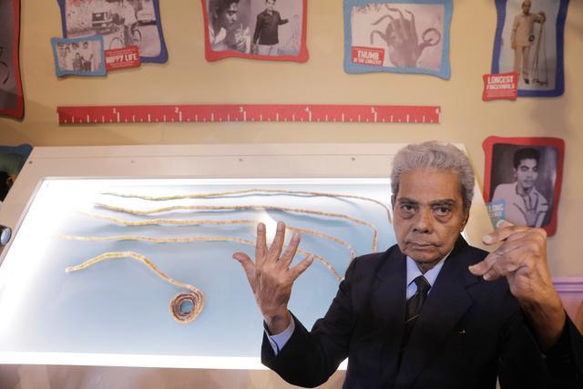 Shridhar Chillal of India displays his newly cut fingernails at an announcement that the five fingernails he grew for 66 years will be displayed in Ripley's Believe it or Not in New York. (REUTERS) Shridhar Chillal of India displays his newly cut fingernails at an announcement that the five fingernails he grew for 66 years will be displayed in Ripley's Believe it or Not in New York. (REUTERS)