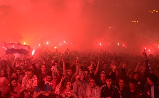 Croatia's fans react after a goal as they watch the broadcast of the World Cup semi-final match between Croatia and England in the fan zone. (REUTERS) Croatia's fans react after a goal as they watch the broadcast of the World Cup semi-final match between Croatia and England in the fan zone. (REUTERS)
