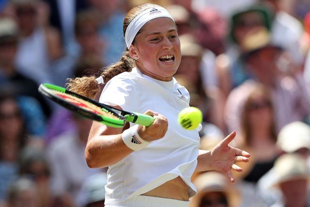 Latvia's Jelena Ostapenko returns against Germany's Angelique Kerber at Wimbledon. (AFP) Latvia's Jelena Ostapenko returns against Germany's Angelique Kerber at Wimbledon. (AFP)