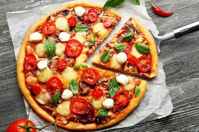 Junk food items like pizzas and burgers harm the intestinal microbiota leading to gastric discomfort. (Shutterstock) Junk food items like pizzas and burgers harm the intestinal microbiota leading to gastric discomfort. (Shutterstock)
