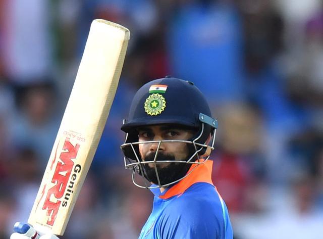 India's Virat Kohli celebrates scoring 50 not out during the One Day International (ODI) cricket match between England and India at Trent Bridge in Nottingham central England on July 12, 2018. (AFP) India's Virat Kohli celebrates scoring 50 not out during the One Day International (ODI) cricket match between England and India at Trent Bridge in Nottingham central England on July 12, 2018. (AFP)