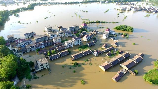 An aerial view shows a flooded village following heavy rainfall in Dongxiang district of Fuzhou, Jiangxi province, China July 8, 2018. (Reuters/Stringer) An aerial view shows a flooded village following heavy rainfall in Dongxiang district of Fuzhou, Jiangxi province, China July 8, 2018. (Reuters/Stringer)