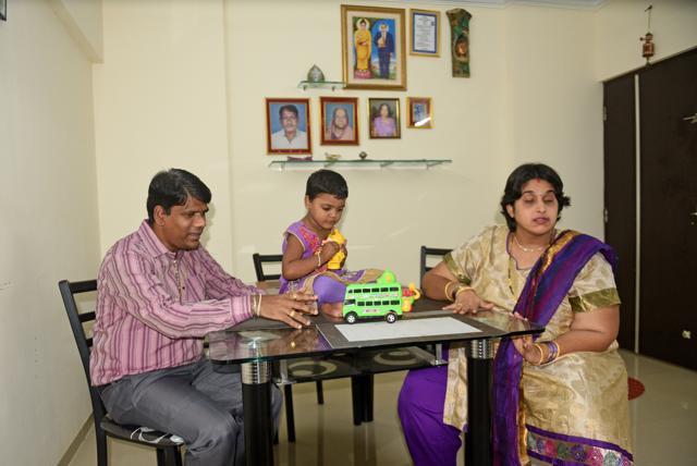 ‘Once we picked our home, we formed a mental map of it, and picked out and arranged the furniture ourselves,’ say Mamta and Namdev Tambe, seen here with daughter Manasvi in their 3BHK flat in Virar. (Satyabrata Tripathy / HT Photo)