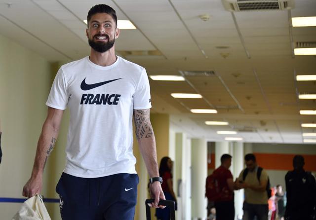 France's forward Olivier Giroud walks at Moscow's Sheremetyevo airport on July 16, 2018, as the French national football team departs after winning the Russia 2018 World Cup. (AFP) France's forward Olivier Giroud walks at Moscow's Sheremetyevo airport on July 16, 2018, as the French national football team departs after winning the Russia 2018 World Cup. (AFP)