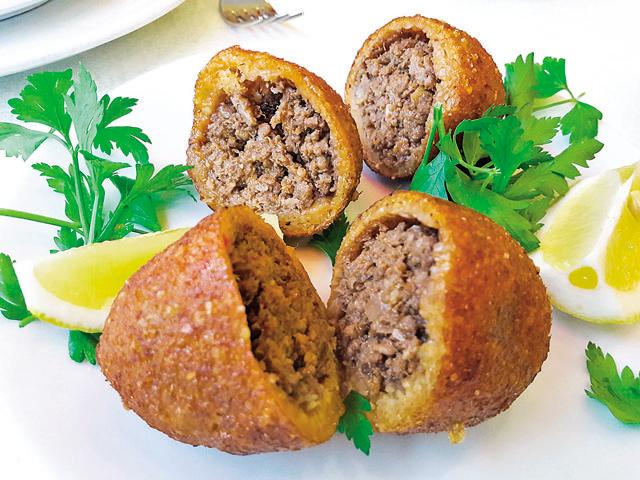 The kibbeh consists of ground meat mixed with bulgur wheat (Shutterstock)