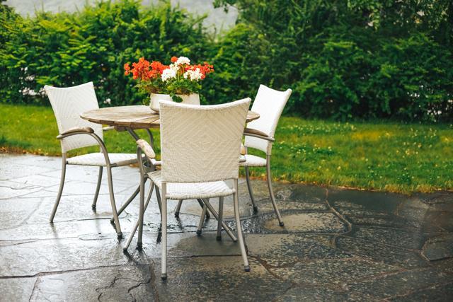 Keep a few chairs, a table and sprinkle plants to accentuate your outdoor lounge space. (Shutterstock) Keep a few chairs, a table and sprinkle plants to accentuate your outdoor lounge space. (Shutterstock)