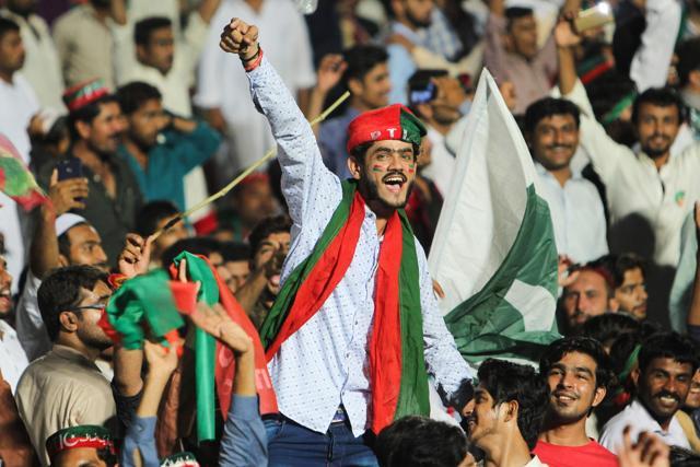 Supporters of Pakistani cricket star-turned-politician and head of the party Pakistan Tehreek-e-Insaf (PTI) Imran Khan cheer as they attend a political campaign rally ahead of the general election in Multan on July 20, 2018. (AFP) Supporters of Pakistani cricket star-turned-politician and head of the party Pakistan Tehreek-e-Insaf (PTI) Imran Khan cheer as they attend a political campaign rally ahead of the general election in Multan on July 20, 2018. (AFP)
