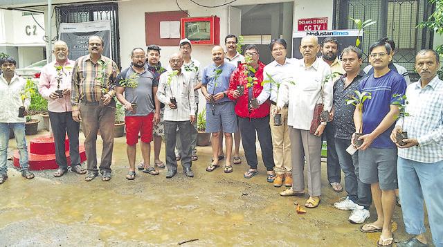A total of 30 saplings each was distributed to the residents of Gardenia housing society, phase I , located in Vadgaonsheri. (HT PHOTO) A total of 30 saplings each was distributed to the residents of Gardenia housing society, phase I , located in Vadgaonsheri. (HT PHOTO)
