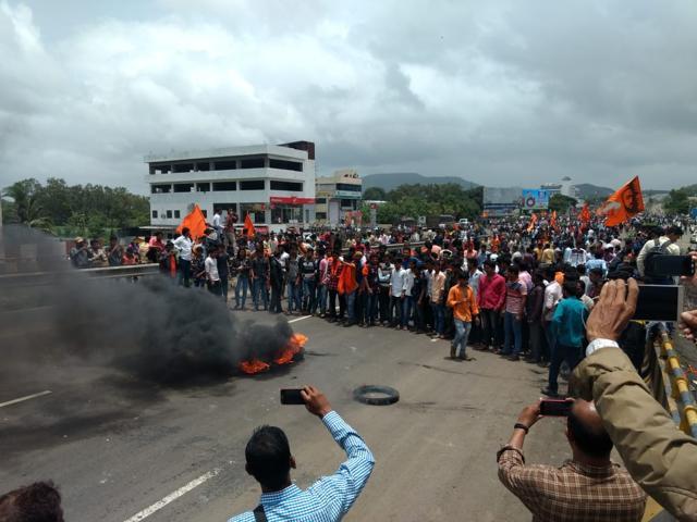 Protestors in Satara blocked the highways and torched a police van on Wednesday. (Raju Sanadi) Protestors in Satara blocked the highways and torched a police van on Wednesday. (Raju Sanadi)