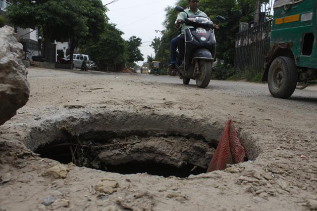 After rain, potholes become a nuisance for Gurugram commuters ...