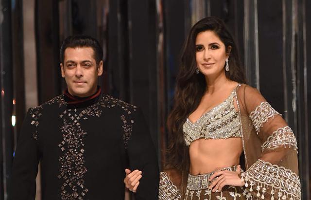 This picture taken on August 1, 2018 shows Bollywood actors Salman Khan and Katrina Kaif (R) presenting creations by designer Manish Malhotra during a fashion show in Mumbai. (AFP) This picture taken on August 1, 2018 shows Bollywood actors Salman Khan and Katrina Kaif (R) presenting creations by designer Manish Malhotra during a fashion show in Mumbai. (AFP)