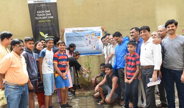 Members of Royal Casa housing society in Ravet, too, helped spread the green message by planting saplings on Sunday. (HT PHOTO) Members of Royal Casa housing society in Ravet, too, helped spread the green message by planting saplings on Sunday. (HT PHOTO)