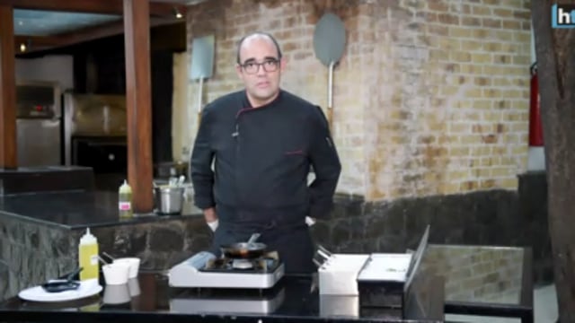 A chef at Sevilla shows us how to make the perfect Prawns al ajillo. (HT File) A chef at Sevilla shows us how to make the perfect Prawns al ajillo. (HT File)
