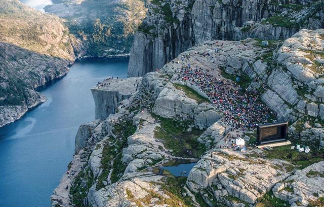 People gather in the mountains near Preikestolen (The Pullpit Rock) in Forsand near Stavanger, western Norway. (AFP) People gather in the mountains near Preikestolen (The Pullpit Rock) in Forsand near Stavanger, western Norway. (AFP)