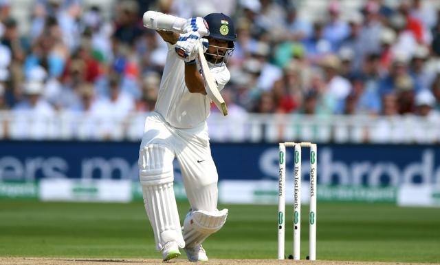India batsman Shikhar Dhawan drives during day two of the first Test Match between England and India at Edgbaston on August 2, 2018 in Birmingham. (Getty Images) India batsman Shikhar Dhawan drives during day two of the first Test Match between England and India at Edgbaston on August 2, 2018 in Birmingham. (Getty Images)